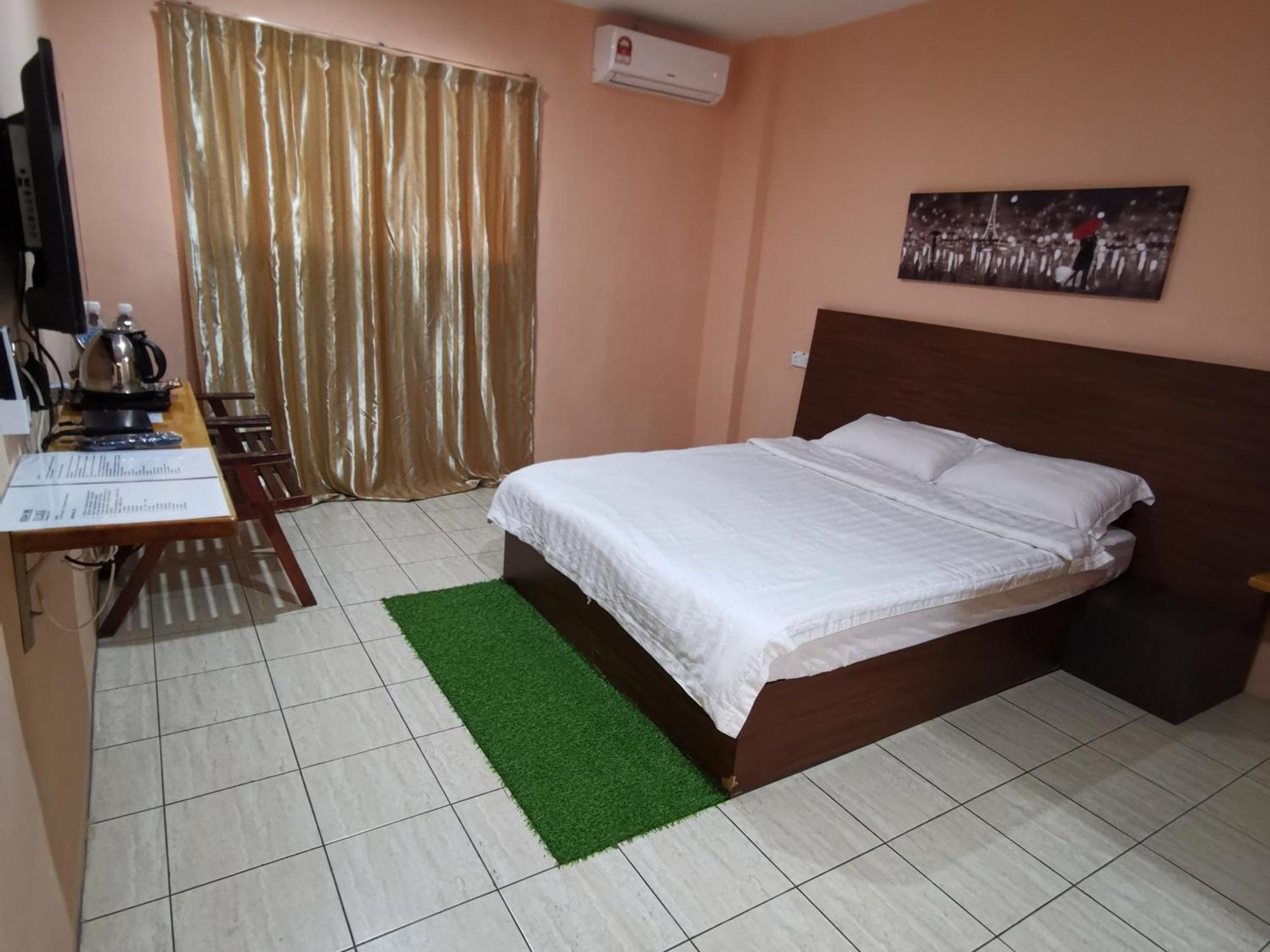 Indah Inn Tawau Szoba fotó